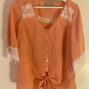 Coral colored blouse